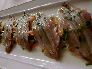 preparazione del pesce alla trattoria Angiolina