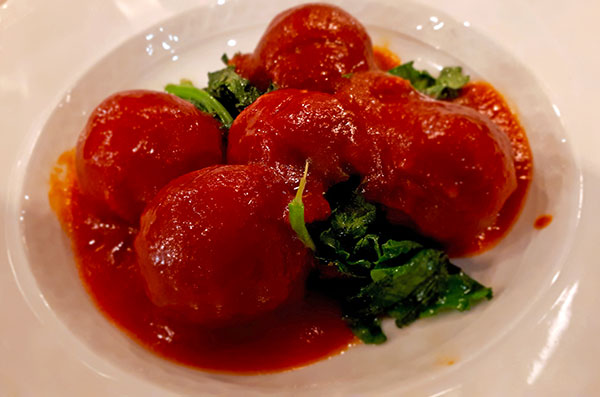 Polpette al sugo con cime di rapa